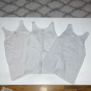 4 plain white tang tops